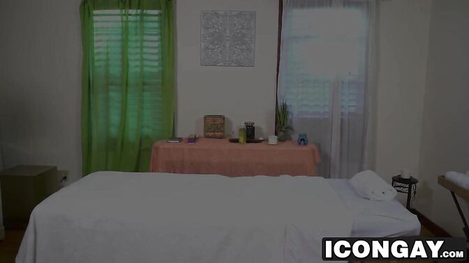 Hunky masseur blowing older guys cock