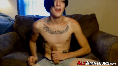 Dark haired guy self pleasuring alone