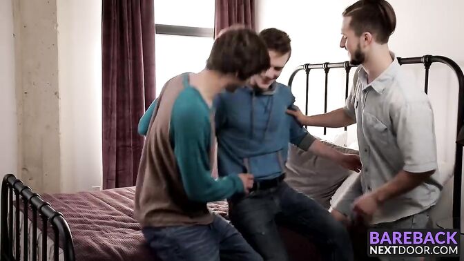 Jocks enjoy a hard bareback threesome