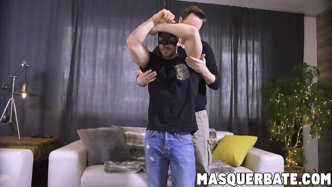 Cute guy gets a handjob from a hot twink