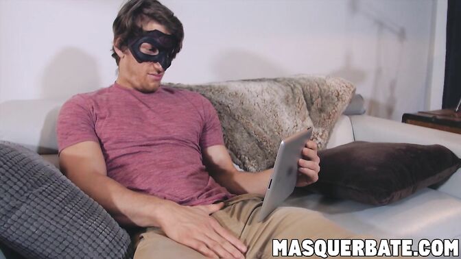Horny stud uses his tablet to jerk off