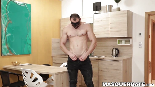 Masked hunk jerking off with style