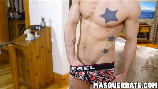 Athletic tattooed jock solo masturbating
