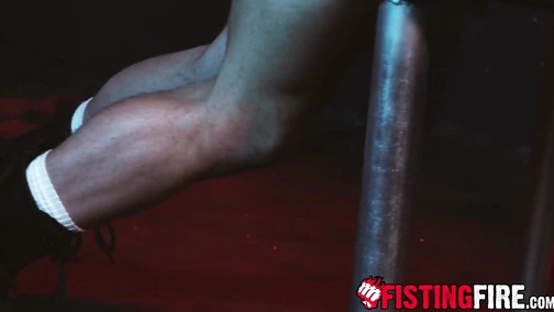 Muscled pervert Davin Strong bents over the officer on a table and explores his body