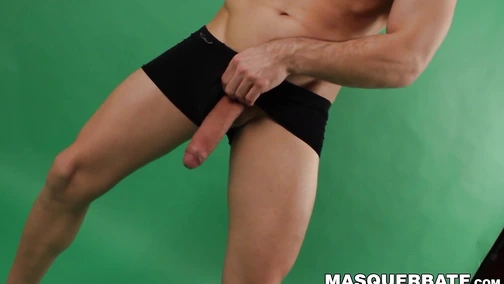 Hung jock Ricky jacks his enormous cock while stripping off