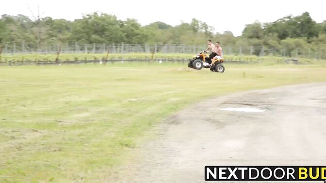 Two sexy studs ride ass on their quad bike