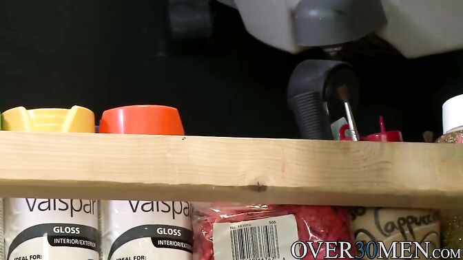 Two hunks having sex in a storage room