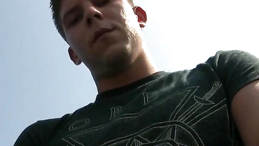 Homo jock rubbing his dick on rooftop