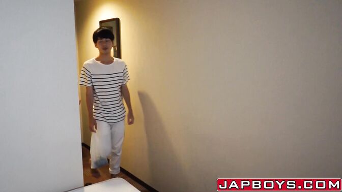 Young gay Japanese riding thick cock
