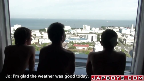 Twink blows two Asian cocks in threesome