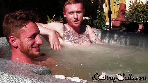 Inked gay jock stroking cock outdoor