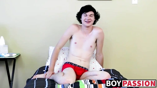 Justin stuffs his asshole with a dildo