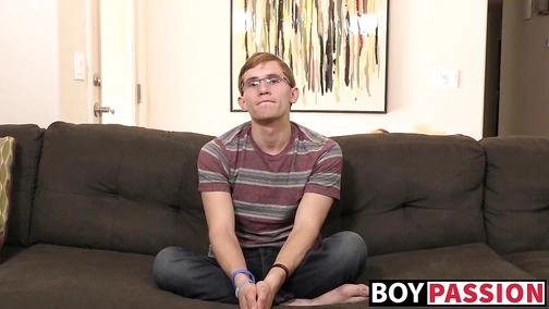 Young man in an interview masturbates